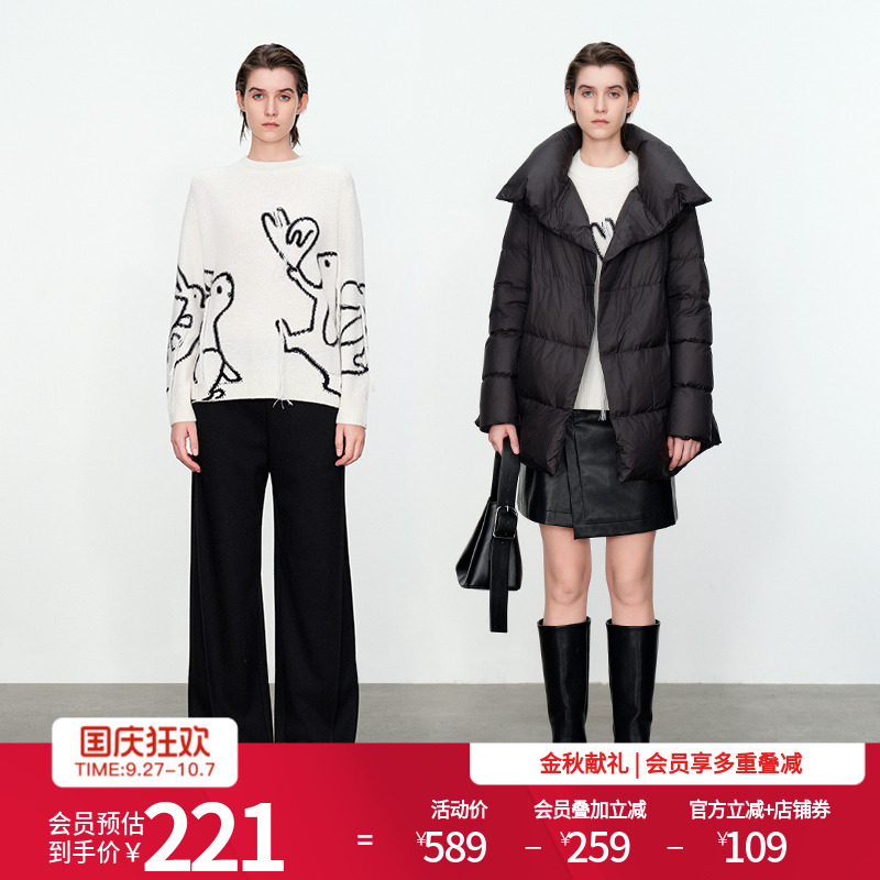 婉甸米白色黑色兔子提花流苏毛衣