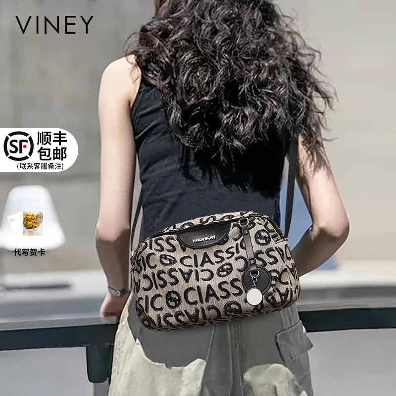 Viney包包2025新款女包斜挎包腋下包秋冬女士小包轻奢胸包帆布包