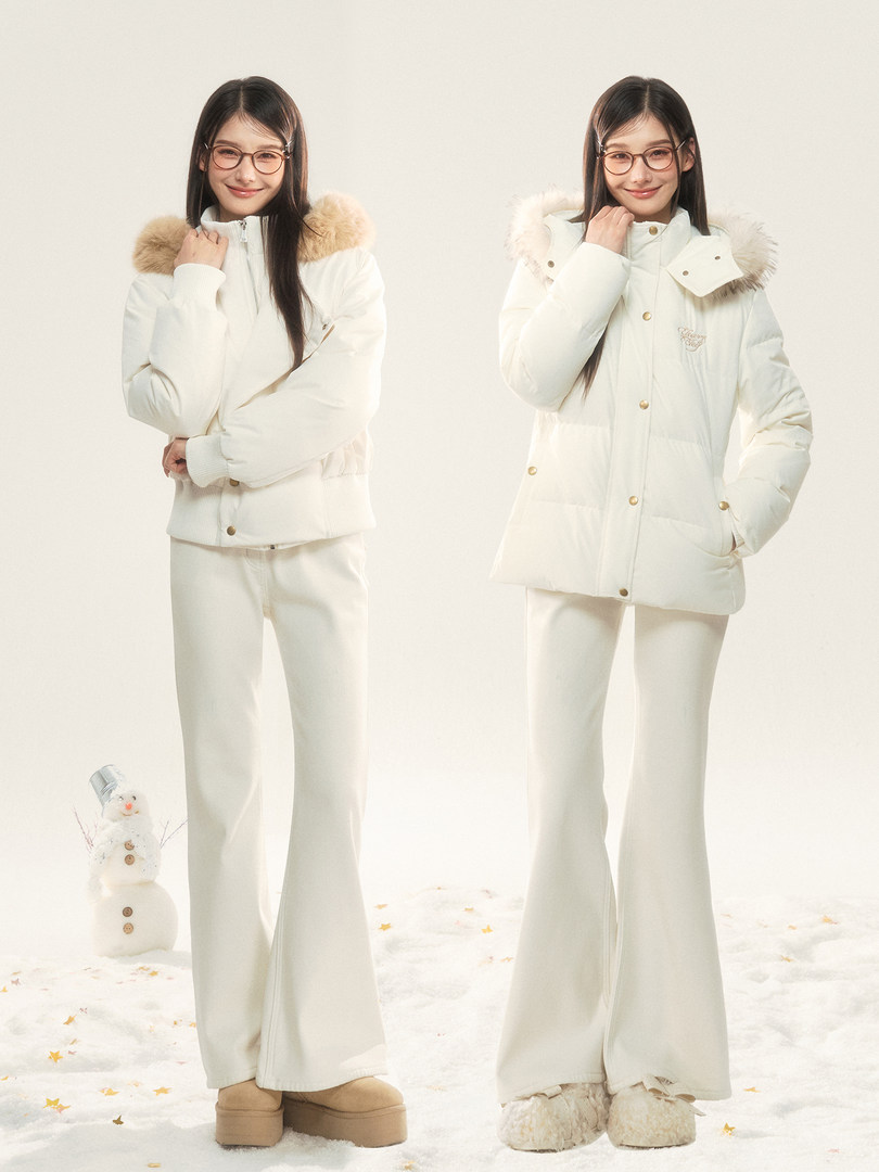 White winter puffer coat and wide-leg pants worn by a model