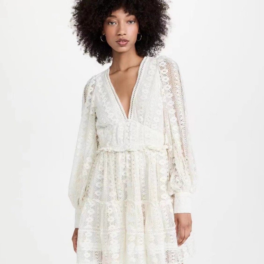 澳洲小众2023早春秋V领长袖收腰镂空短款连衣裙女单件A字裙高腰