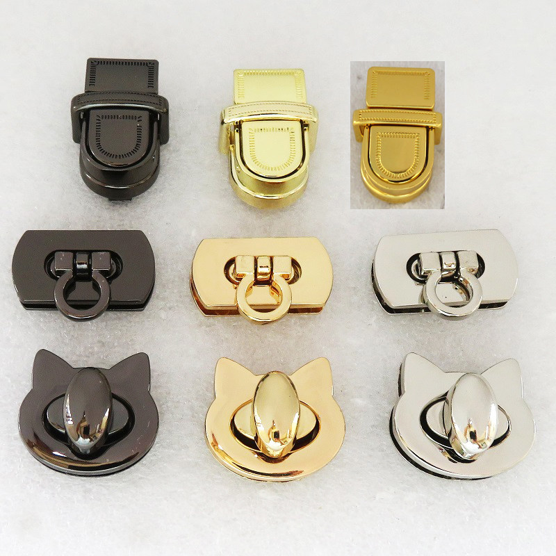 新款箱包金色猫头条纹插锁扣子拧锁活页锁锁扣配件五金银白色黑色