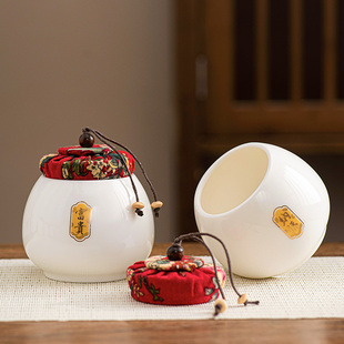 羊脂玉白瓷普洱红绿茶叶存储密封防潮罐国潮招财进宝聚财桌面摆件