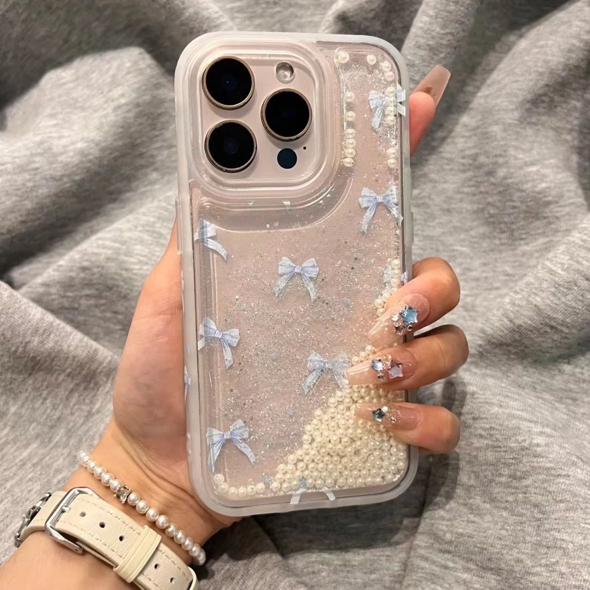 小清新蝴蝶结流沙适用于苹果iPhone16promax手机壳13/14透底15pro