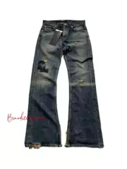 Cousin Erd Produces Distressed Vintage Flared Jeans with a Six-Pointed Star Patch, a Distressed Wash, and a Vintage Look