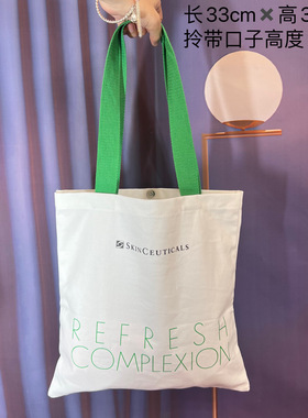 修丽苛白色帆布斜挎袋绿色单肩拎带化妆包大容量收纳包手提