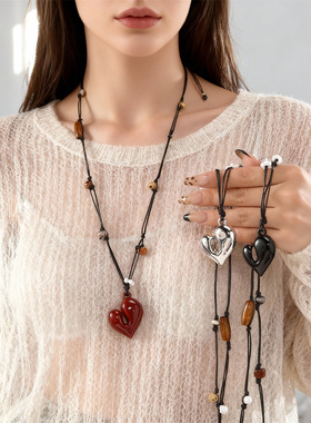 A heart-shaped pendant necklace with a feminine design sense