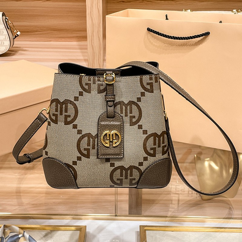 法国小众气质女包斜挎印花水桶包