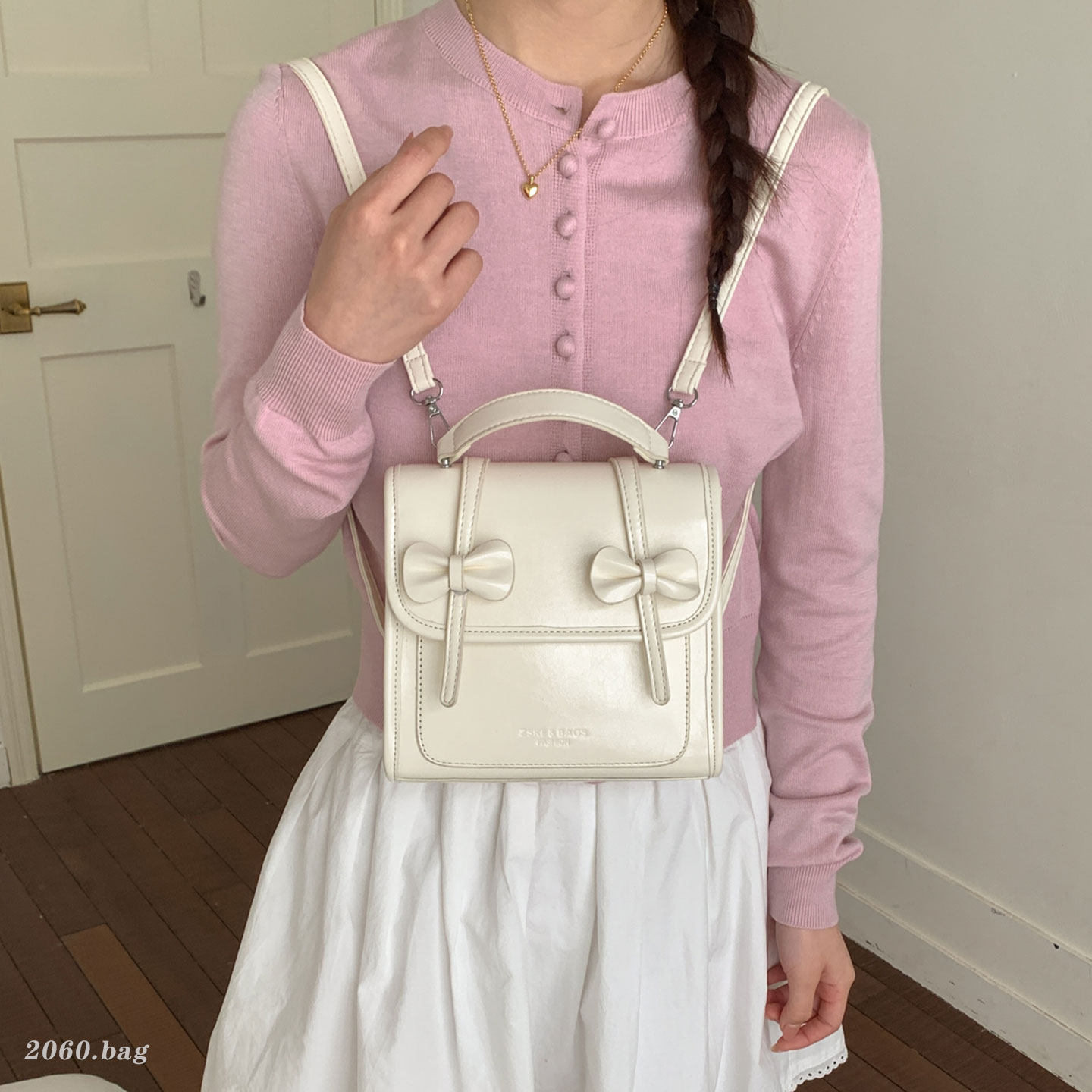 韩版蝴蝶结双肩包女2026新款纯色通勤时尚简约手提包高颜值小方包