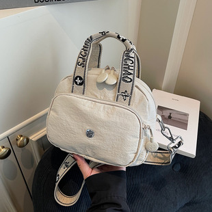 韩版休闲帆布包包女式小众设计手提2026新款逛街出行单肩包斜挎包