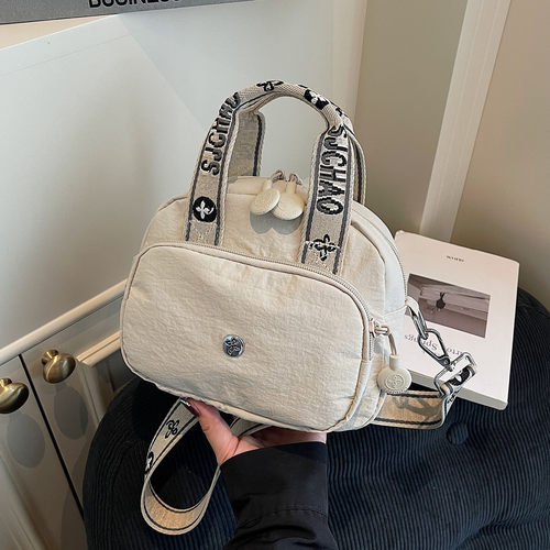 韩版休闲帆布包包女式小众设计手提2025新款逛街出行单肩包斜挎包