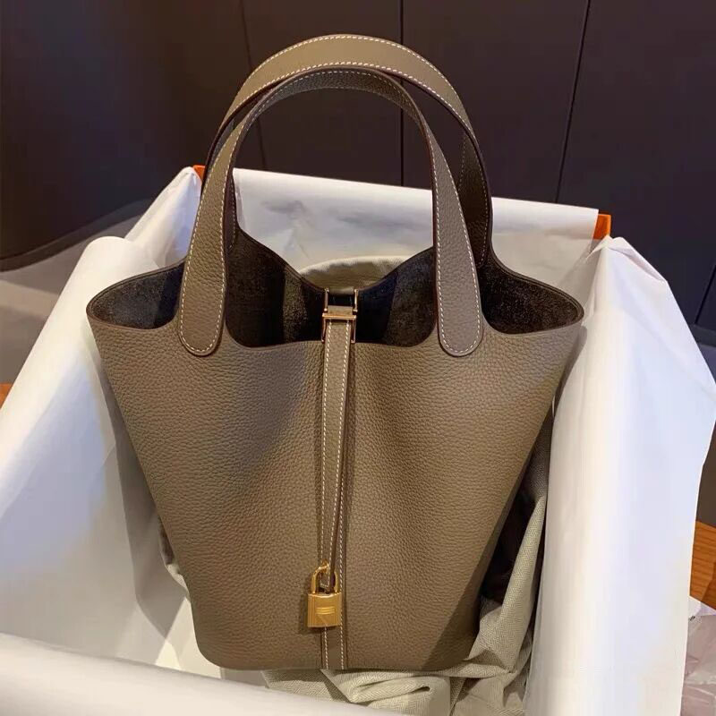 包包女2023新款秋季手拎菜篮子包斜挎真皮水桶包小众高级包妈妈包