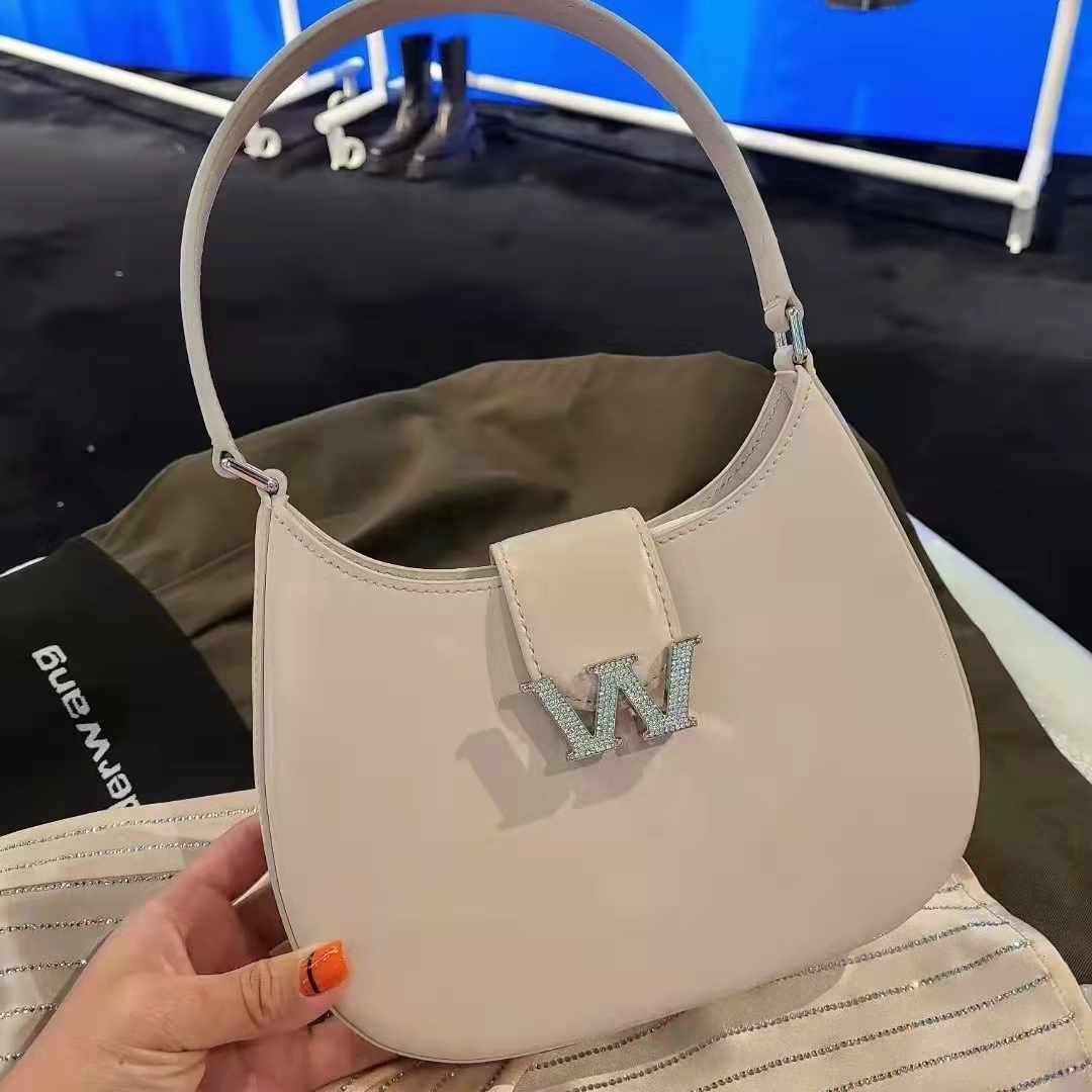 真皮包女2023新款高级感小众法棍腋下包斜挎手提包高版本沙漏包