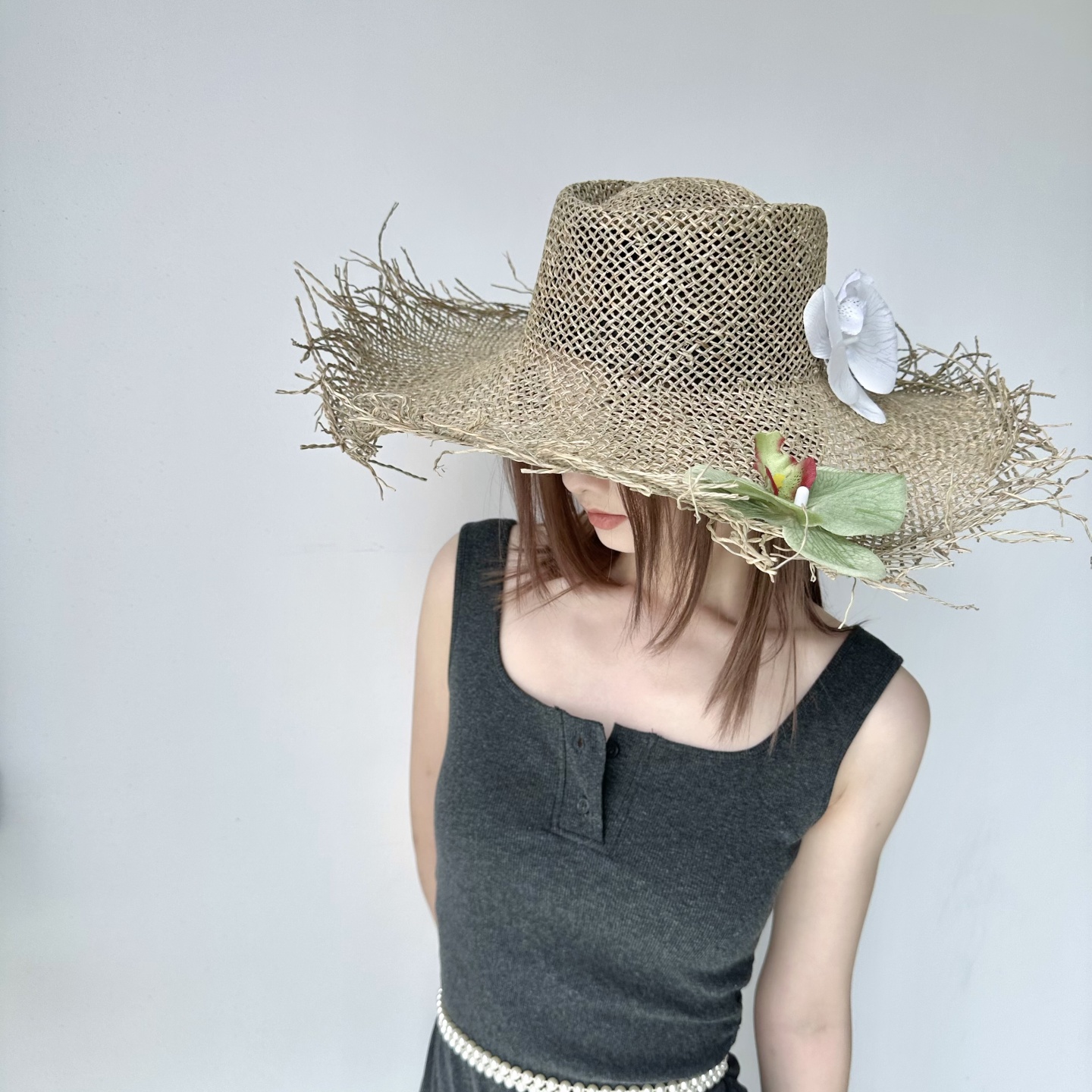 小众长毛边蝴蝶兰花朵镂空海草帽