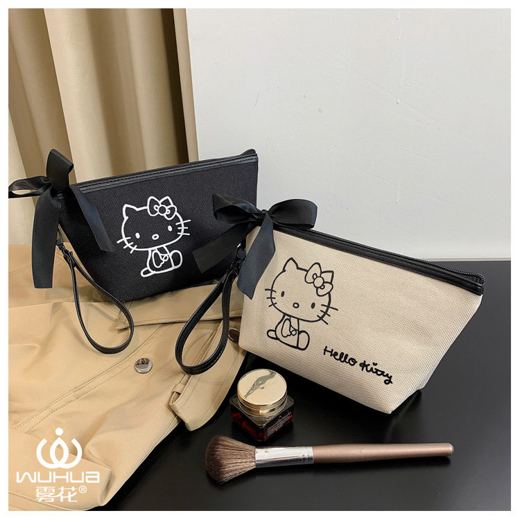 雾花HelloKitty正版授权韩版蝴蝶结化妆包化妆袋零钱包手机包