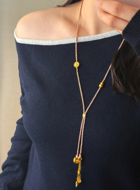 国风粉色编织绳钱袋子金色小马吊坠流苏项链女长款抽拉设计毛衣链