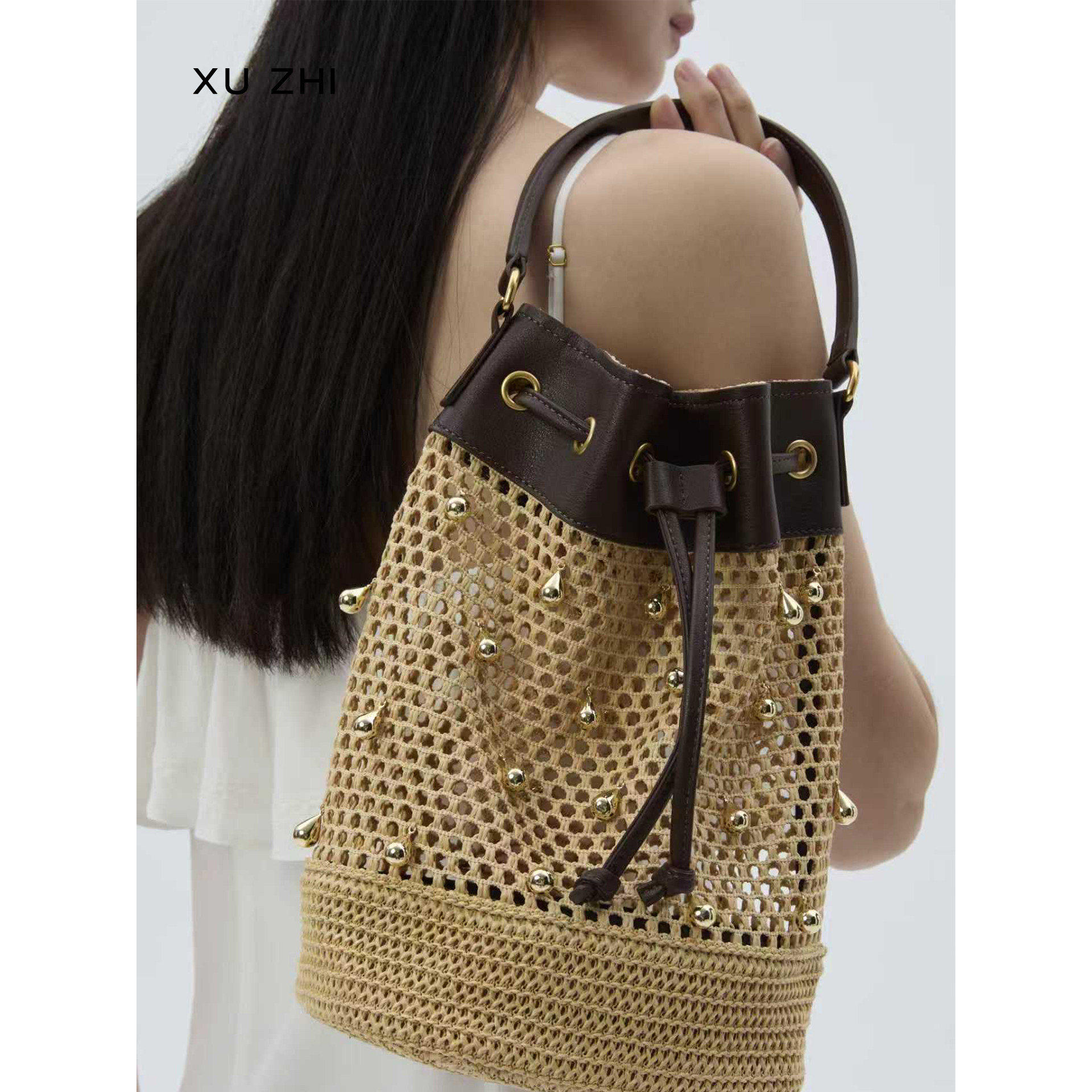 现货XU ZHI 26春季新品 金属装饰编织手提斜挎水桶包