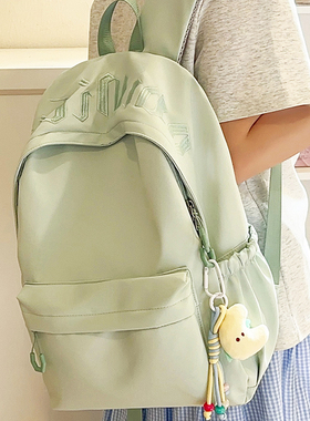 绿色书包初中女生小学生2025新款大容量高中轻便减负防水双肩包女