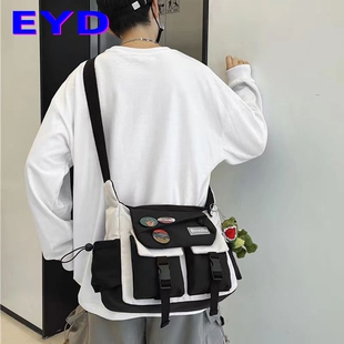 户外防水斜挎包男士2025新款男款单肩邮差包女通勤电脑帆布背包