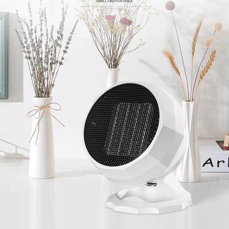 新款直销小型暖风机省电速热取暖器冷热两用空调扇办公家用烤炉桌