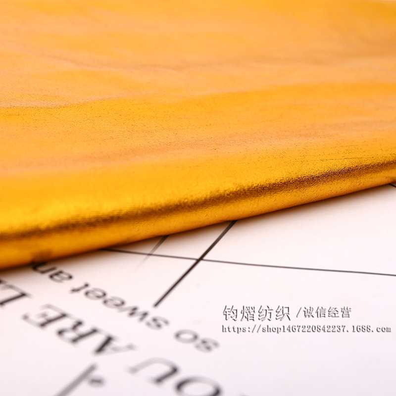新款直销四面弹力烫金布料氨纶底布针织面料舞台表演装演出服饰布