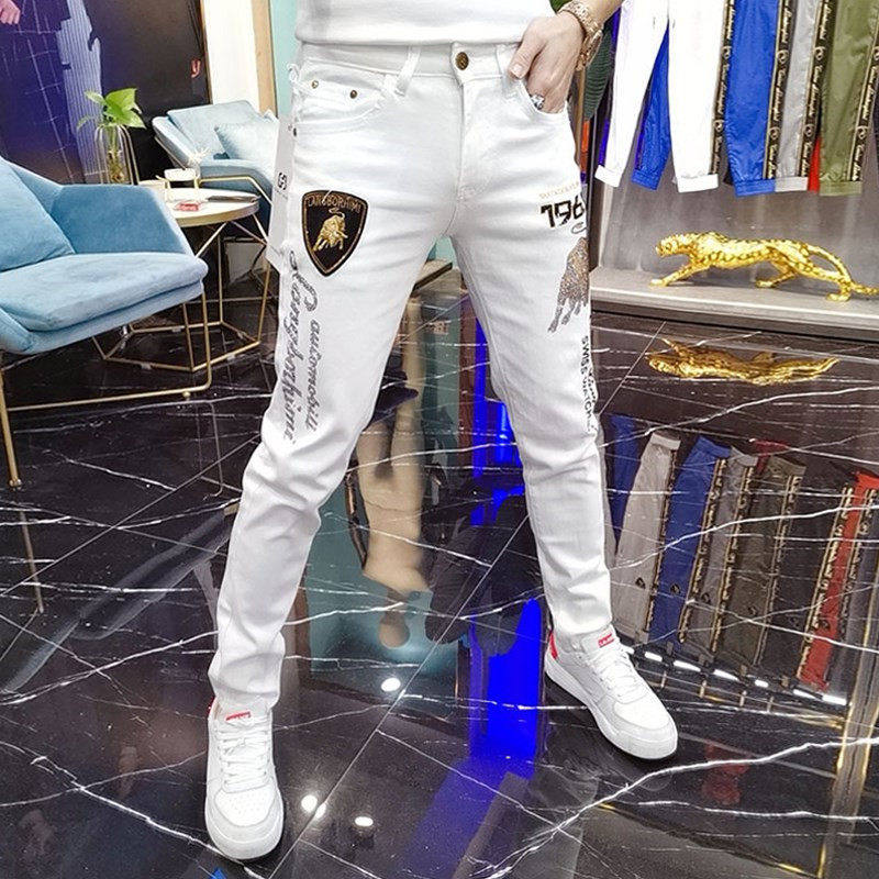 欧洲站2026春秋季潮牌金牛烫钻刺绣白色牛仔裤男修身紧身小脚裤子