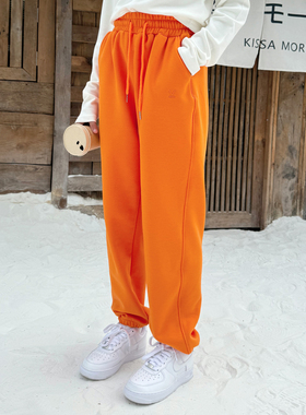 女大童加绒运动束脚裤2025冬青少年男童宽松学生韩版休闲长裤橙色