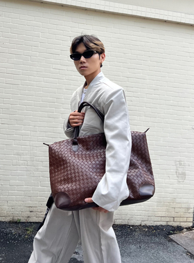 NIN小众设计慵懒松弛感编织托特大包手提男女行旅包大容量皮质pu