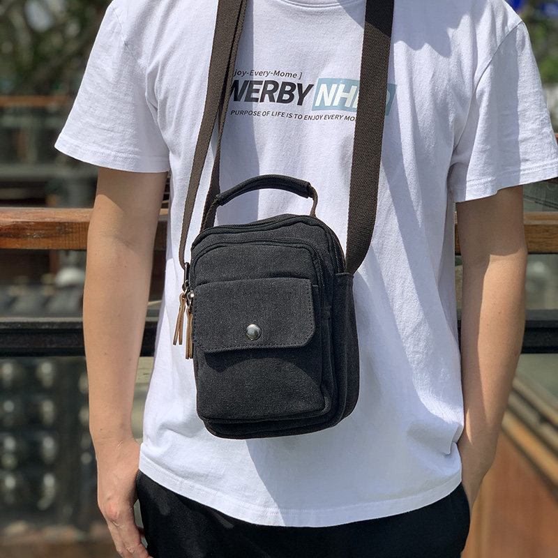 可手提多隔层单肩帆布包休闲男包图片