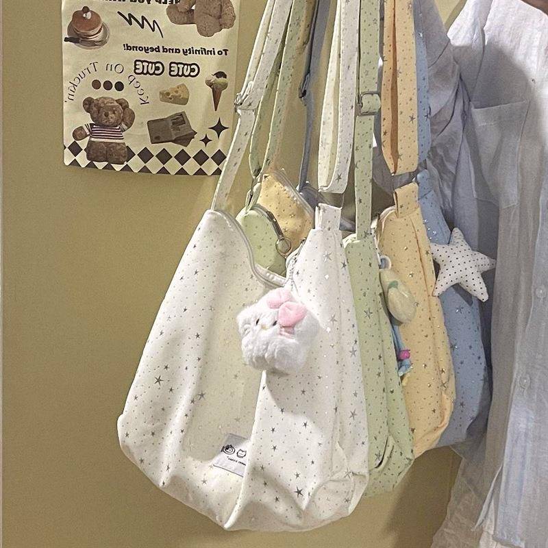 日系简约大容量星星单肩包女休闲百搭学生斜挎包通勤手提包饺子包
