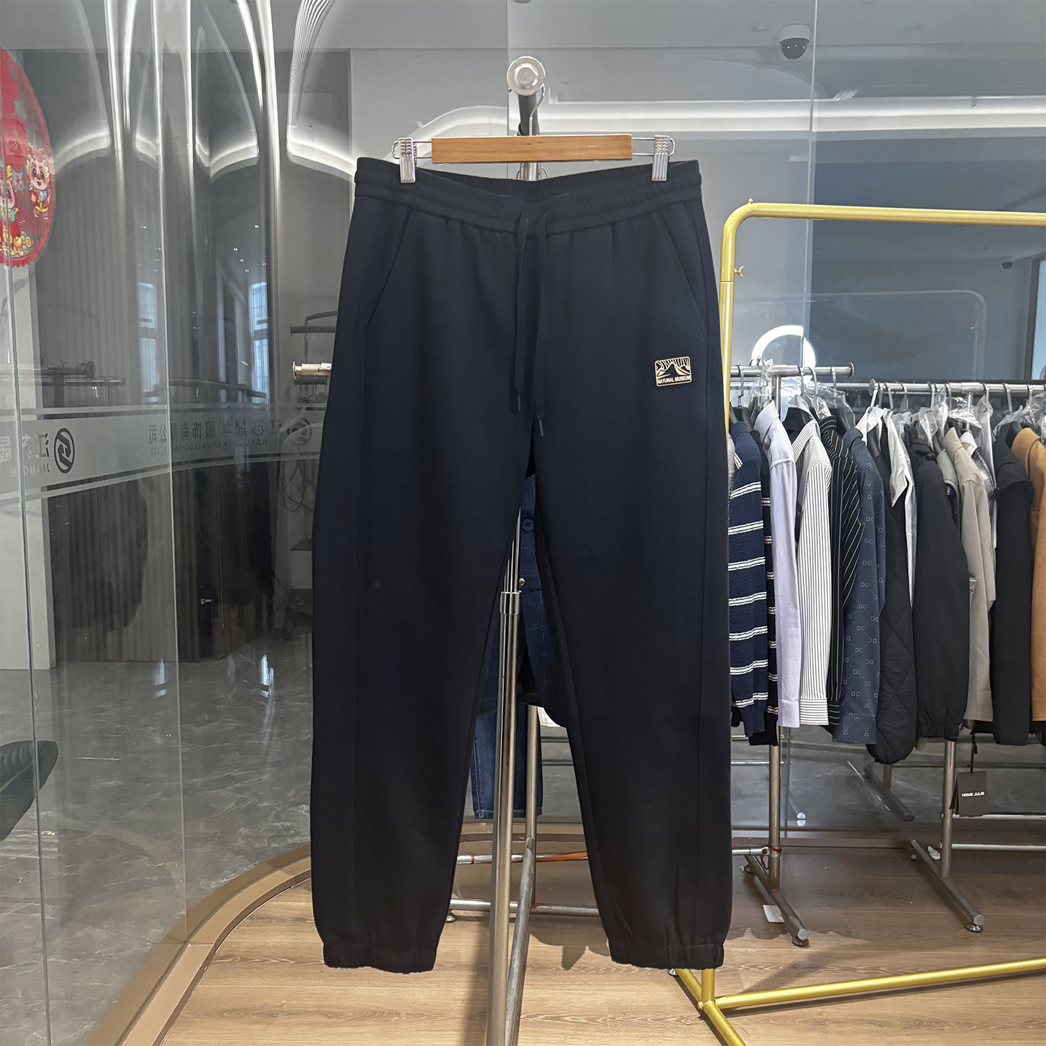 豆家77棉黑色束脚九分裤卫裤