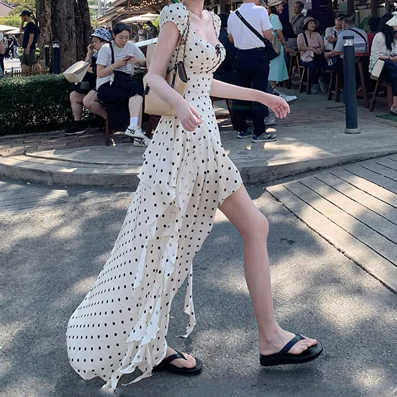 不规则裙摆连衣裙女2026春夏新款韩系缎面波点天丝印花露背长裙子