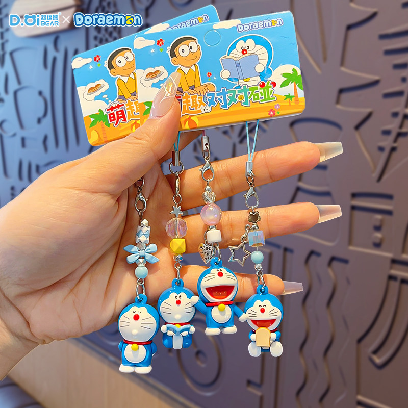 正版哆啦A梦小鼻嘎钥匙对扣挂件图片