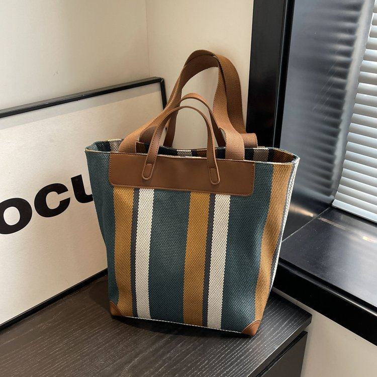 森系条纹编织托特大包2025春季新款气质通勤拉链单肩包ins手提包