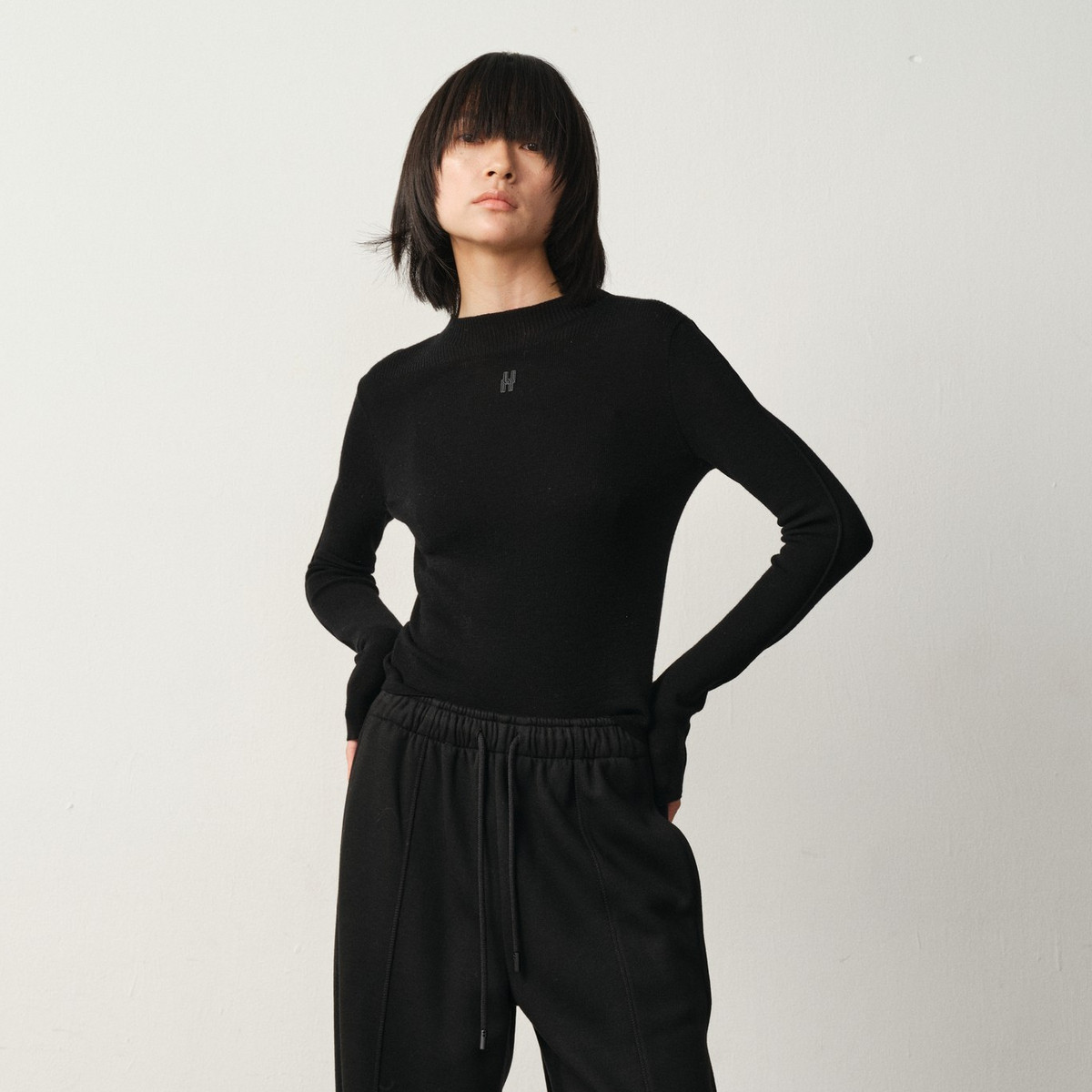 uti尤缇2025冬季新款黑色半高领套头针织衫女修身毛衫UK421131590