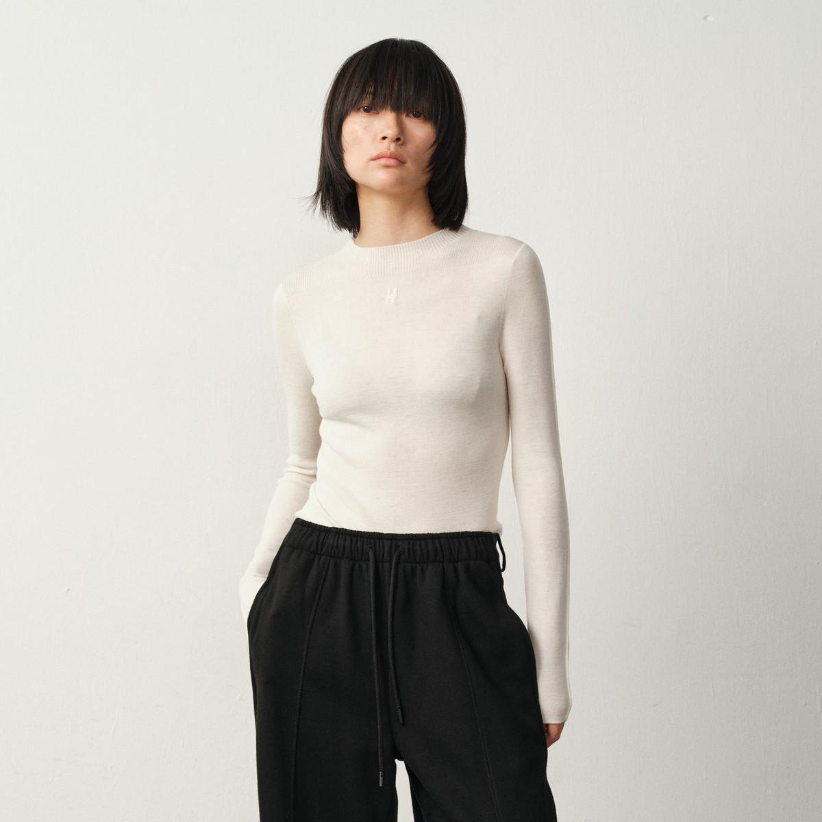 uti尤缇2025冬季新款亲肤半高领套头针织衫女白色毛衫UK421131551