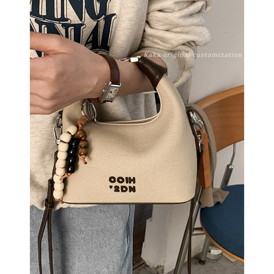 卡乐儿韩国手提新月包小众腋下包