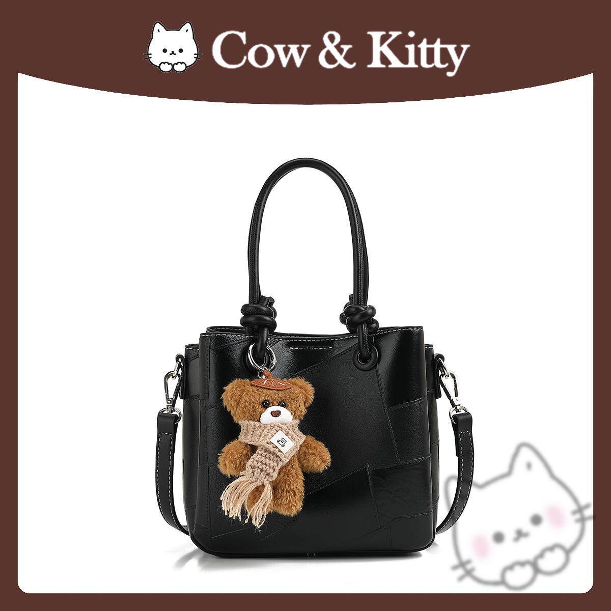 正品cowkitty时尚大容量水桶女包气质通勤百搭手提单肩斜挎包