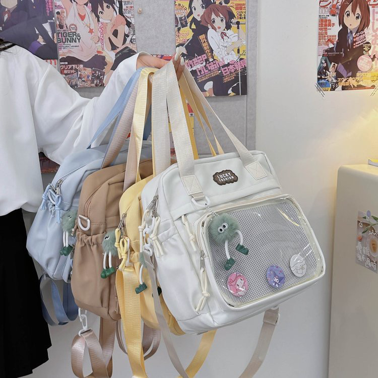 日系百搭高颜值单肩斜挎包ins学院风软妹女双肩包大容量吧唧痛包