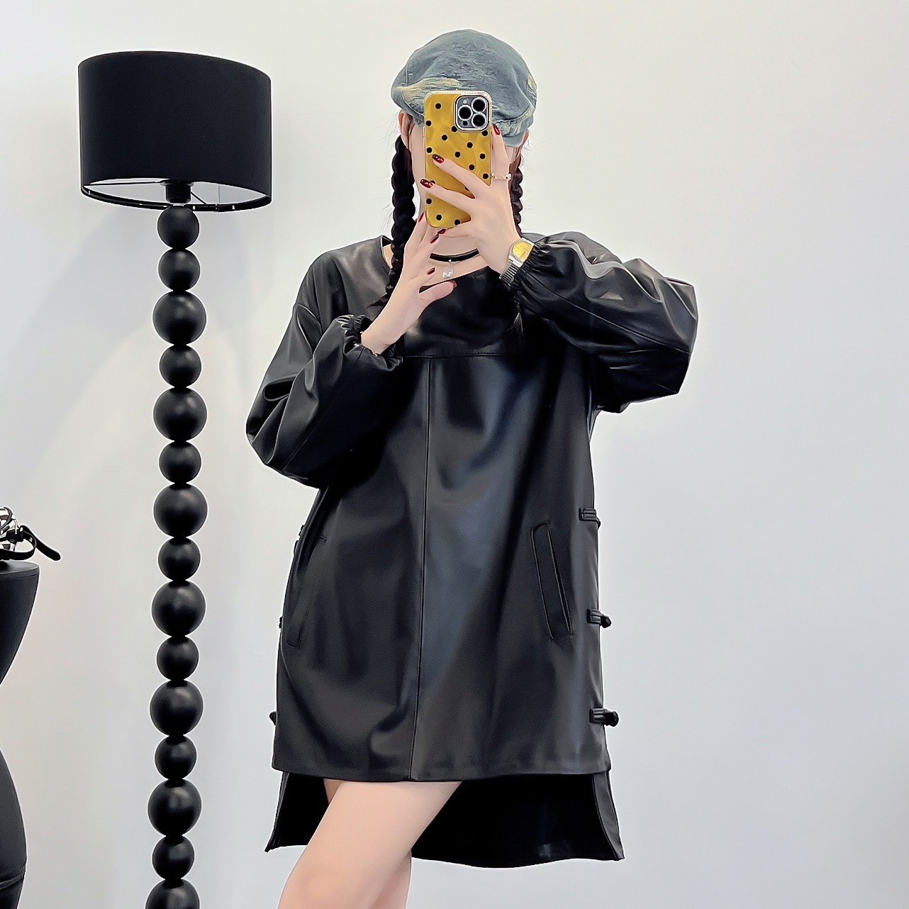 长袖连衣裙女2025年秋季新款真皮黑色不对称皮裙绵羊皮韩版中长裙
