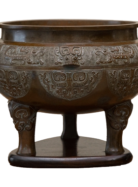 龟文堂造铜饕餮纹鼎式火炉