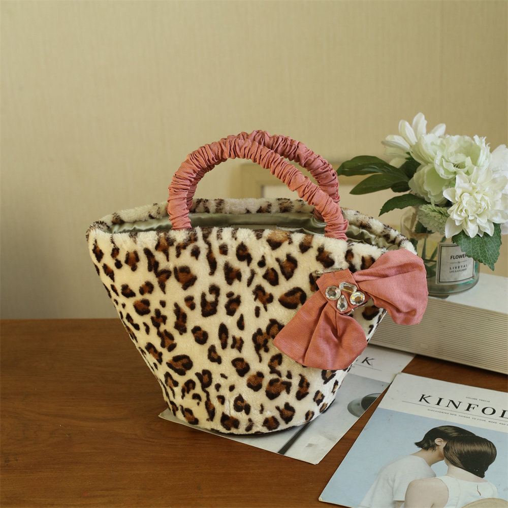 秋冬日单孤品温暖感可爱毛绒绒粉色蝴蝶结豹纹手提包少女系甜美