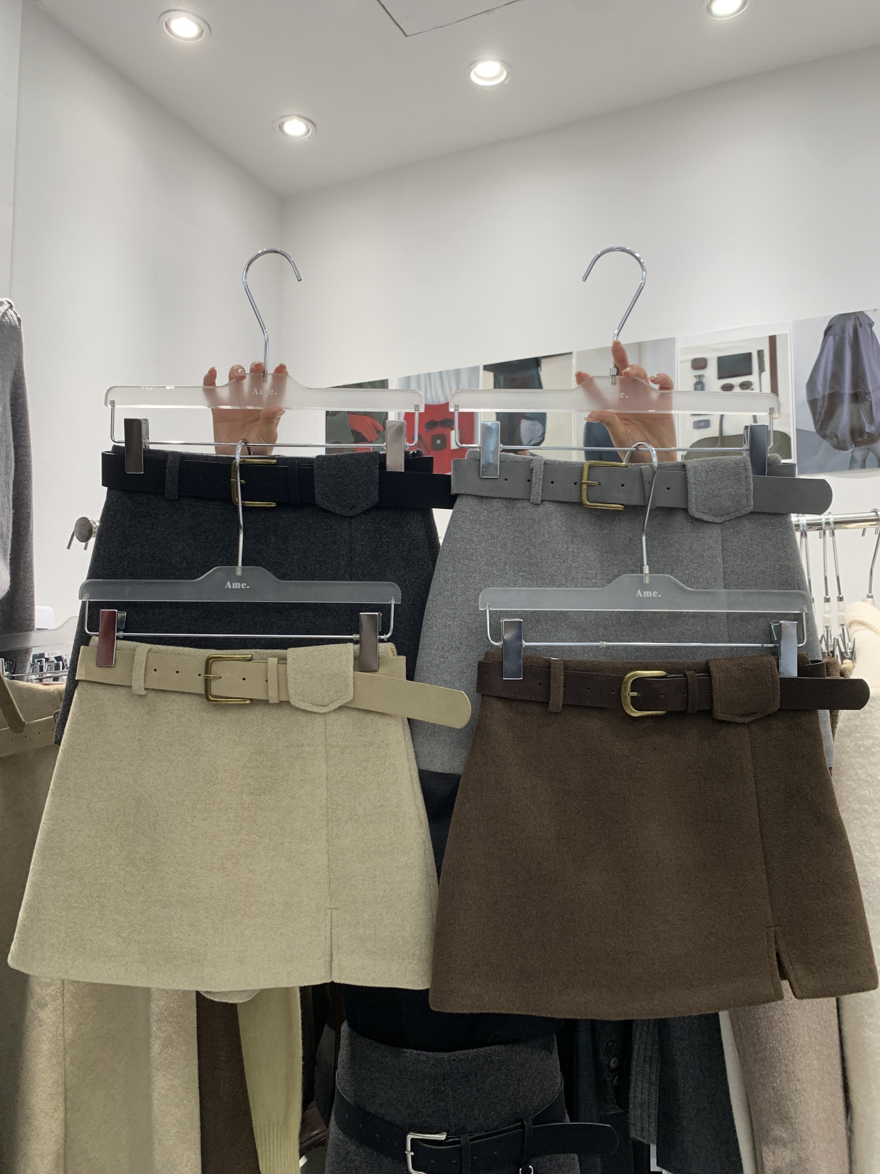 AME2025新款韩版冬高品质加厚羊毛呢配皮带开叉配皮带半身裙A字裙