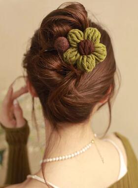 An old curry flower with a hair clip and a girls 2024 back