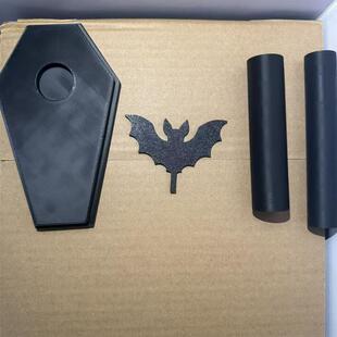 A tableclothed bat roller for the Halloween theme paper towe