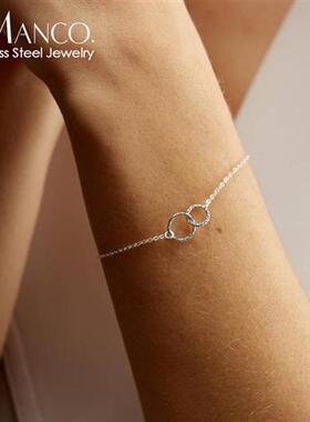 eManco's apparel is about stainless steel-plated gold circle
