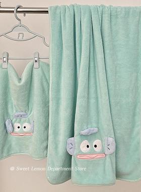 Homeroom master baths with thick coral towels and three love