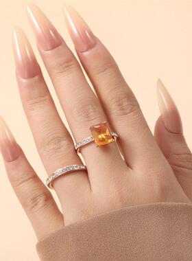 The O.S.P.C. ring, and the style is just about orange and tw