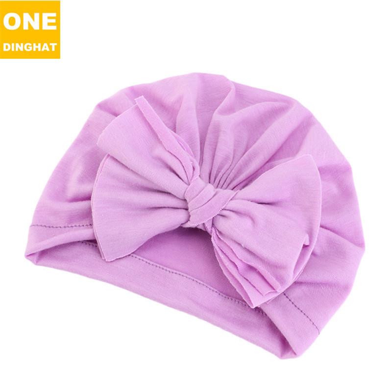 Childrens hats are tangled with a soft, knitted and wrinkle