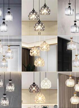A three-headed chandelier for the 9U Dining Room and a conde