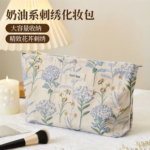 ins奶油刺绣花朵高级感化妆包大容量水乳收纳袋女旅行便携手拿包